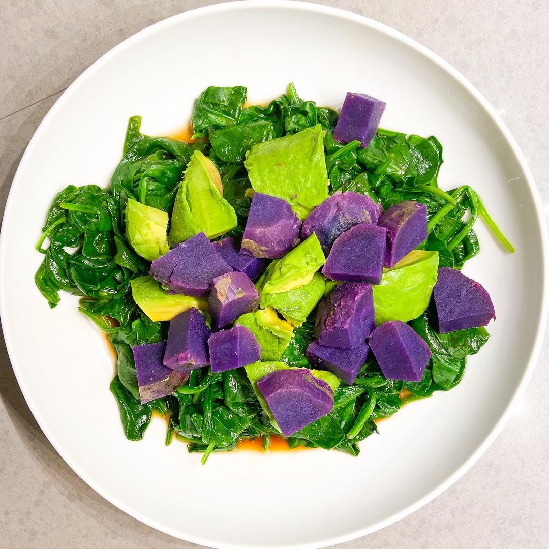 Warm salad Blanched spinach avocado and purple potato balsamic vinegar